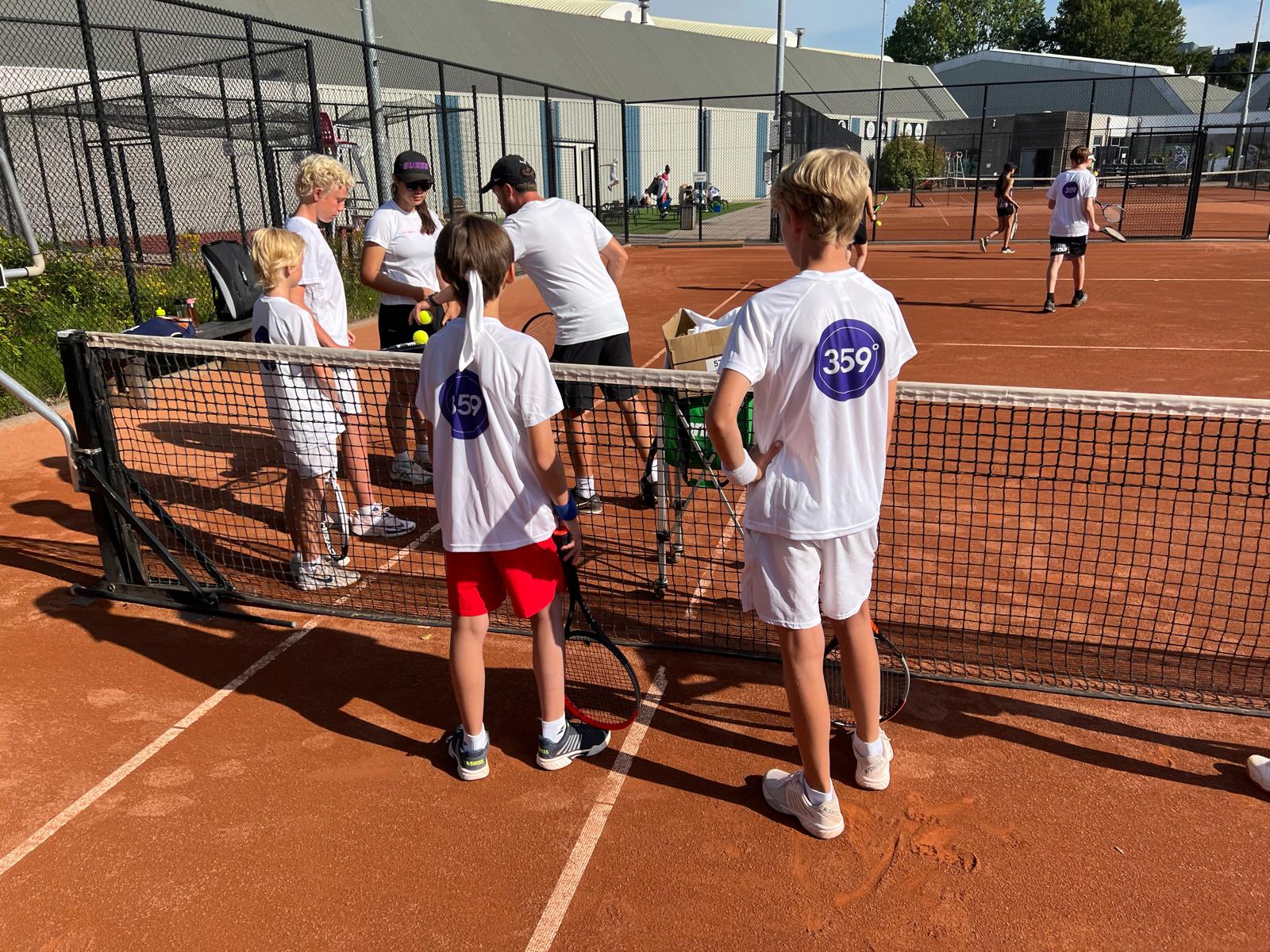 Practising at the net – 359 tennis camp Amstelveen