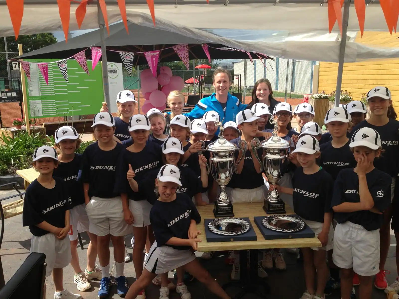 359.tennis trained ball kids with trophies at the annual Future tournament at TV De Kegel