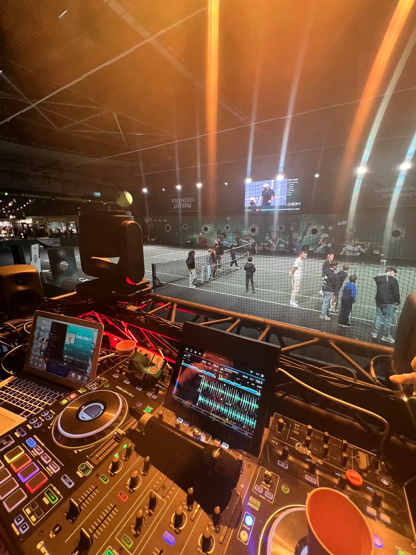 DJ booth overlooking kids clinic in arena