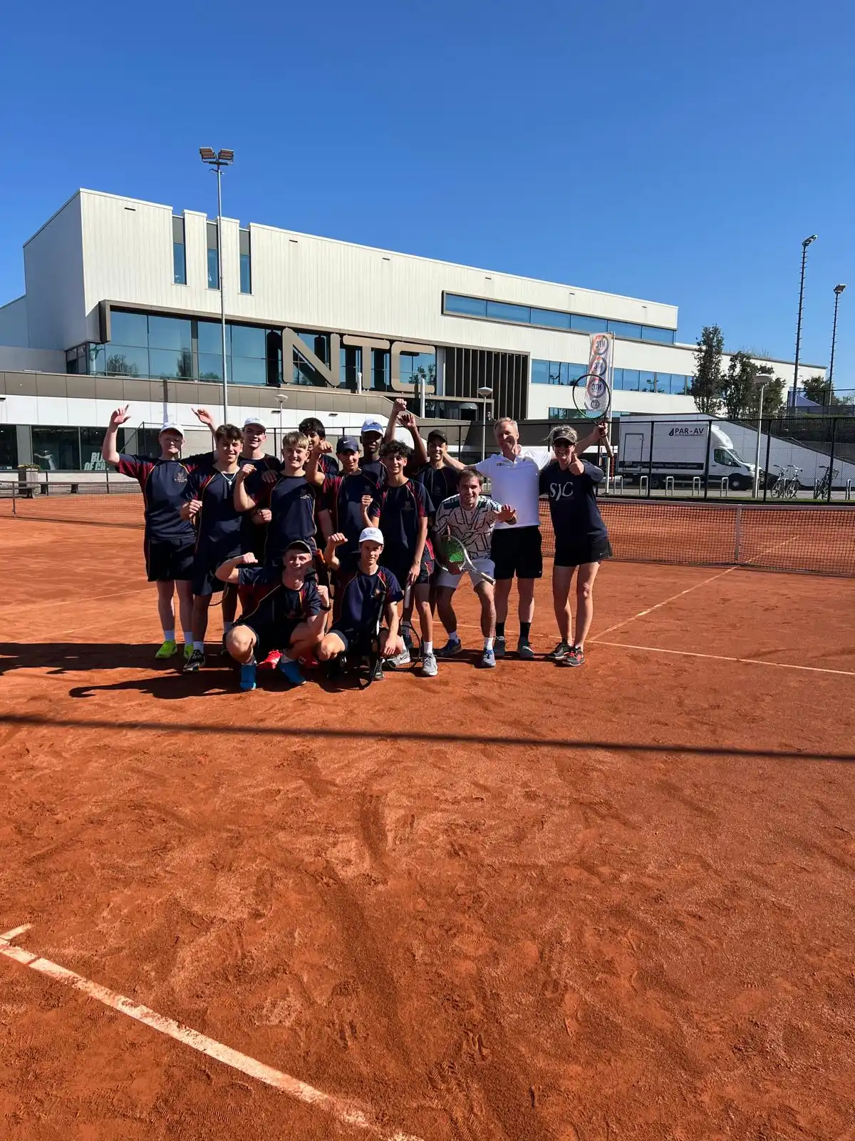 International school tennis team celebrates victory on clay court NTC Amstelveen 359.tennis
